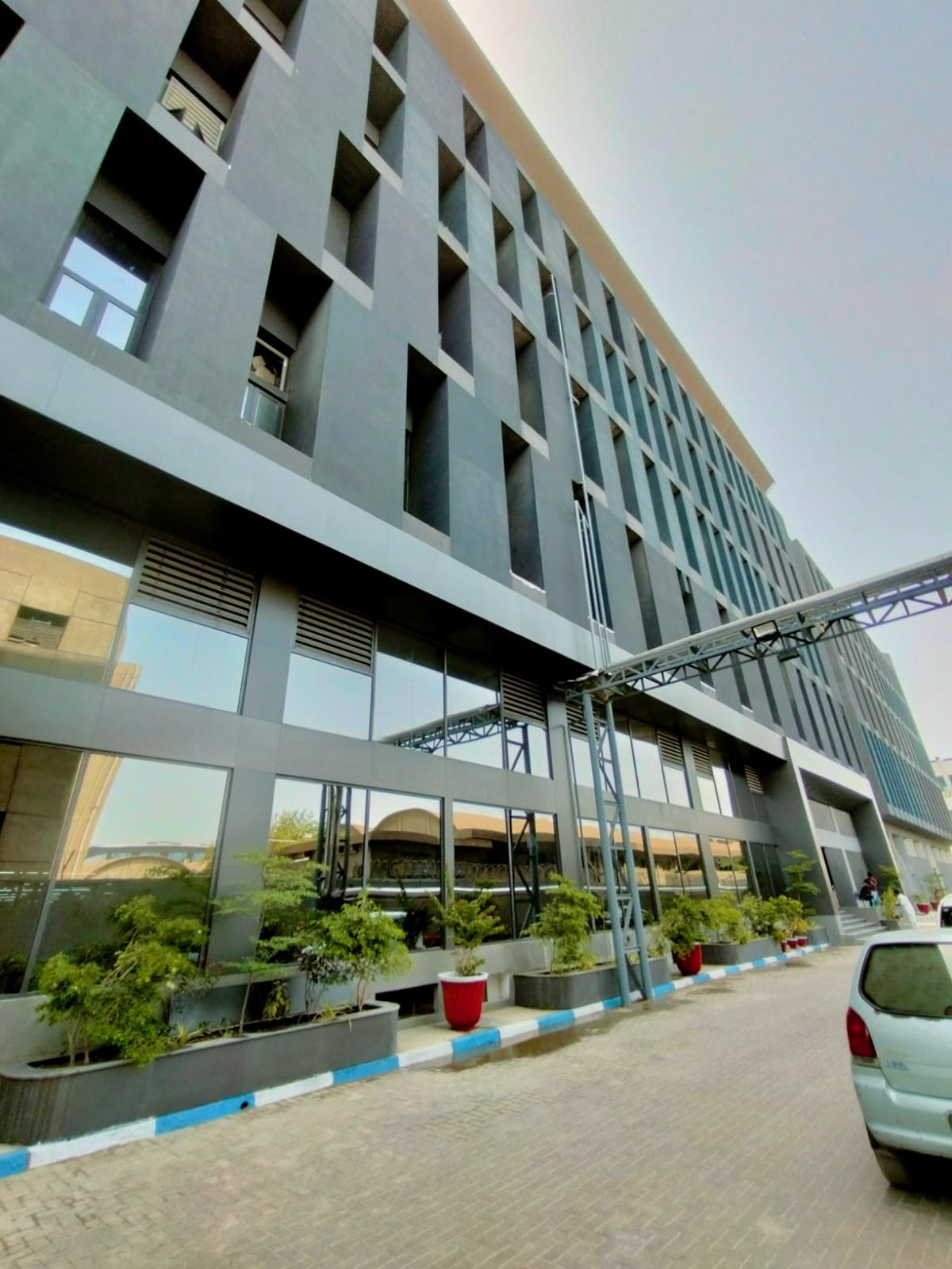 AM4C — Artistic Milliners Building Elevation & Office — Artistic Milliners commercial / facade + office in Korangi, Karachi, Pakistan — view 4